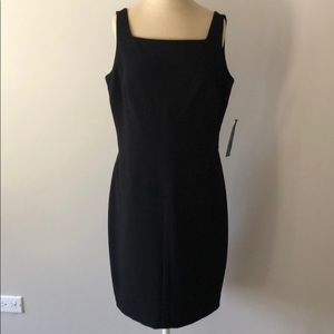 Fitted black dress for business or cocktails